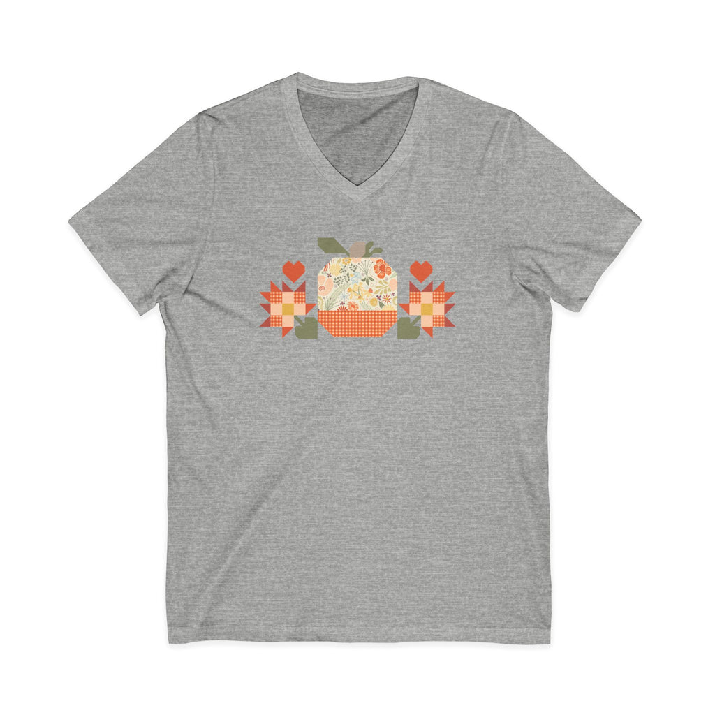 Falling for Fall patchwork pumpkin with quilt-block stars and hearts on a V-neck t-shirt in athletic heather grey, front view – Kate Spain design for Pat Sloan