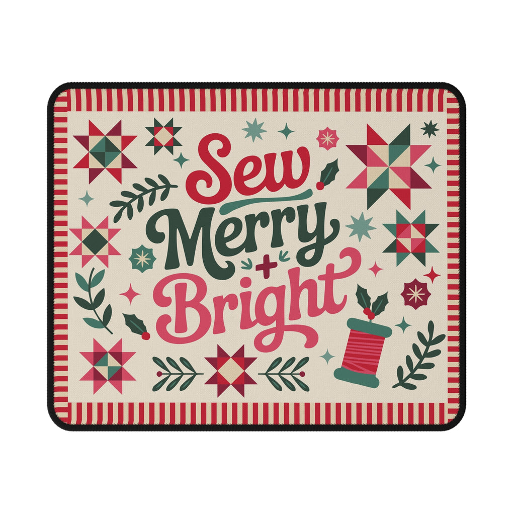 Sew Merry + Bright lettering mouse pad with quilt-block stars and holly, top view – Kate Spain design for Pat Sloan