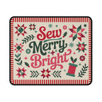 Sew Merry + Bright lettering mouse pad with quilt-block stars and holly, top view – Kate Spain design for Pat Sloan