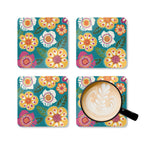 Sorrento cork-backed coaster set of four, retro yellow, white, pink and orange blooms on turquoise, four coasters with a latte mug – Kate Spain design