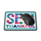 Sew Thankful patchwork lettering mouse pad, with a computer mouse – Kate Spain design for Pat Sloan