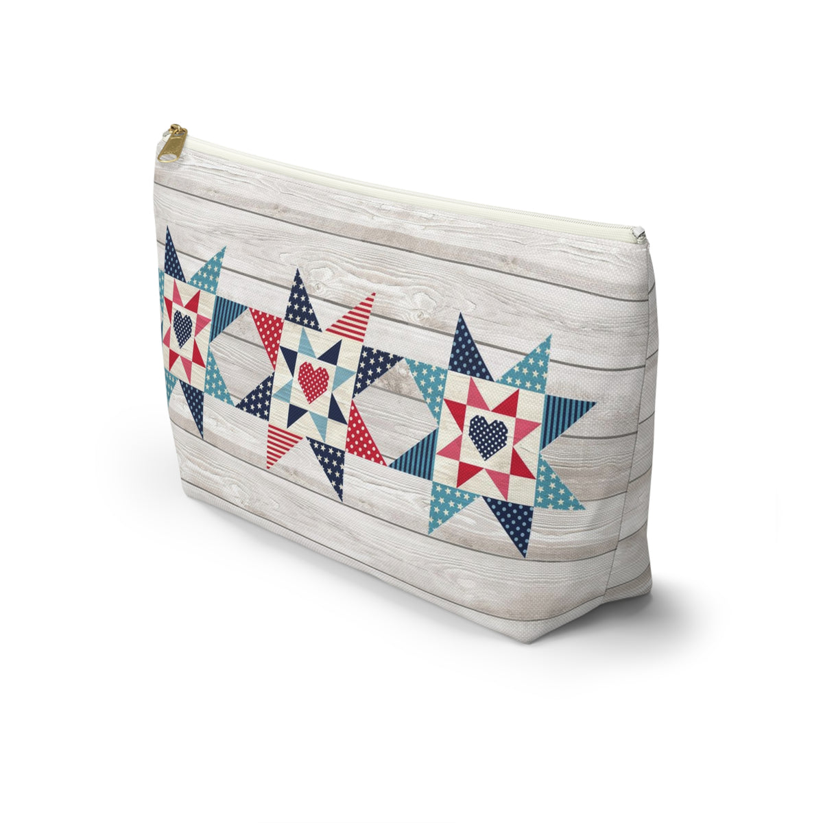 Liberty Love zip pouch with star quilt blocks on the front and hearts on the back, angled front view – Kate Spain design for Pat Sloan