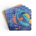 Oceana Fish cork-backed coaster set of four, teal, orange and gold tropical fish on swirling blue waves, coasters fanned out – Kate Spain design