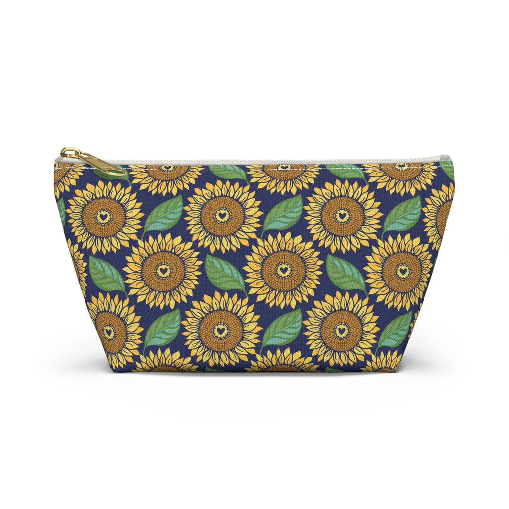 Zip pouch with golden sunflowers and green leaves on navy, white zipper, front view – Kate Spain design