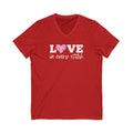 Love in Every Stitch distressed lettering on a V-neck t-shirt in red, front view – Kate Spain design for Pat Sloan