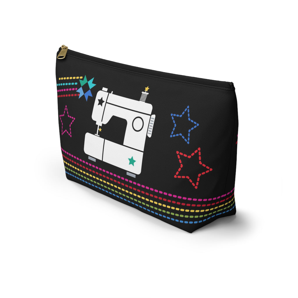 Black zip pouch with the May the ¼" Be With You sewing machine design and stars, angled front view – Kate Spain design for Pat Sloan
