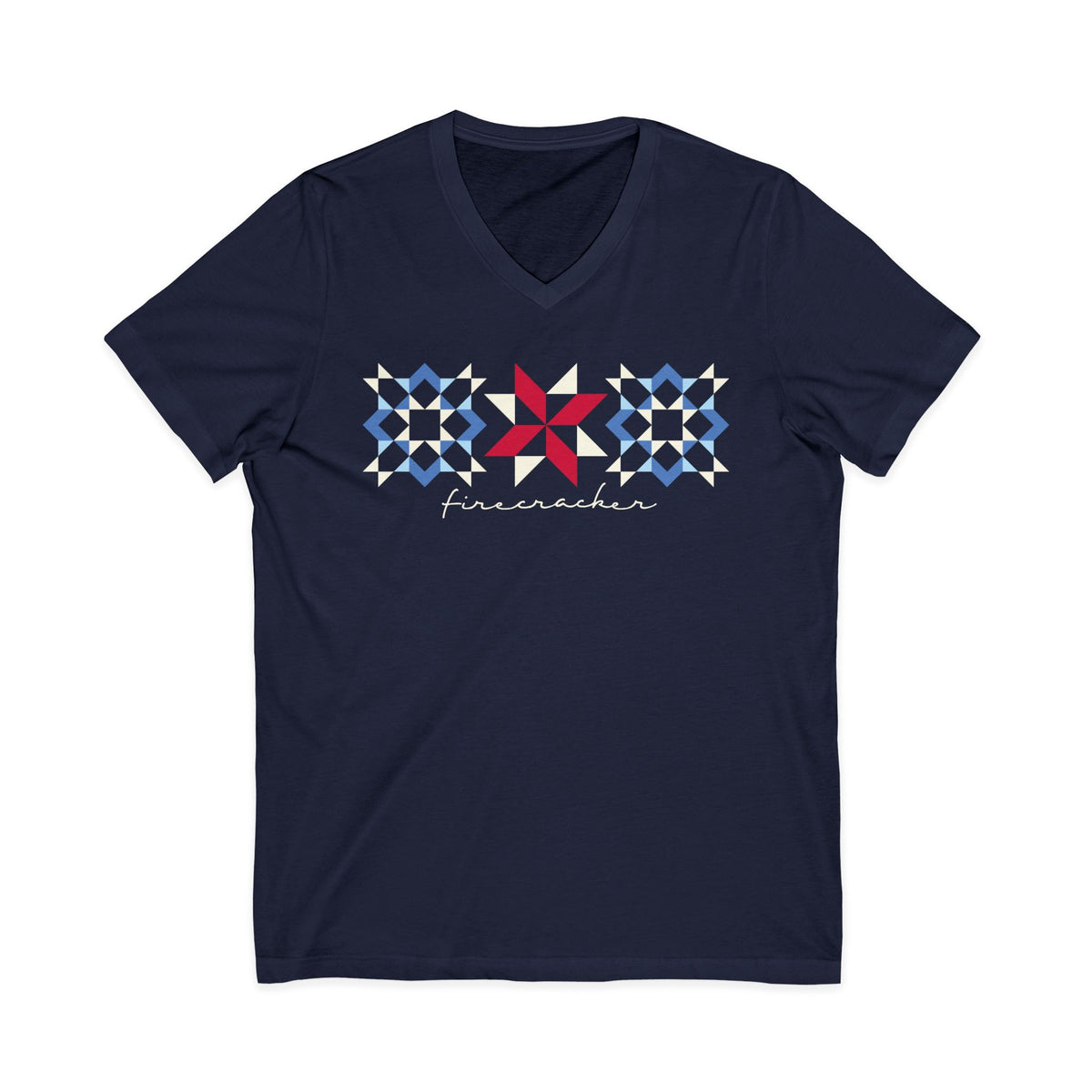 Firecracker quilt-block stars with script lettering in red, white and blue on a V-neck t-shirt in navy, front view – Kate Spain design for Pat Sloan
