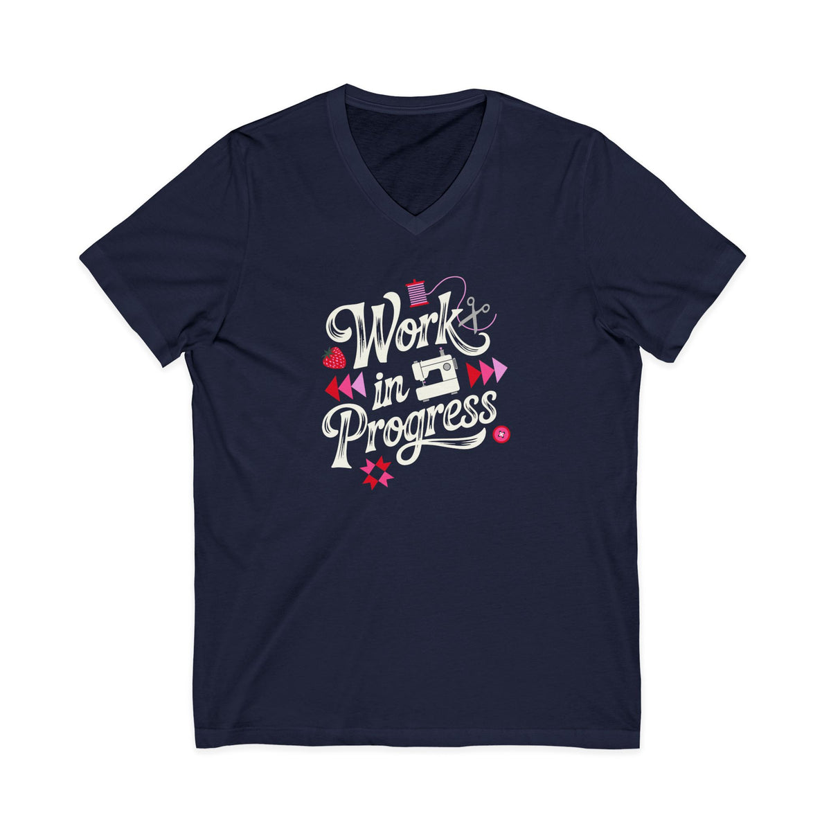 Work in Progress sewing design with flying geese, sewing machine, strawberry and thread spool on a V-neck t-shirt in navy, front view – Kate Spain design for Pat Sloan