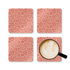 Canto Mandarin cork-backed coaster set of four, cream botanical spirals and petals on tomato red, four coasters with a latte mug – Kate Spain design