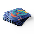 Oceana Fish cork-backed coaster set of four, teal, orange and gold tropical fish on swirling blue waves, stacked set, angled view – Kate Spain design