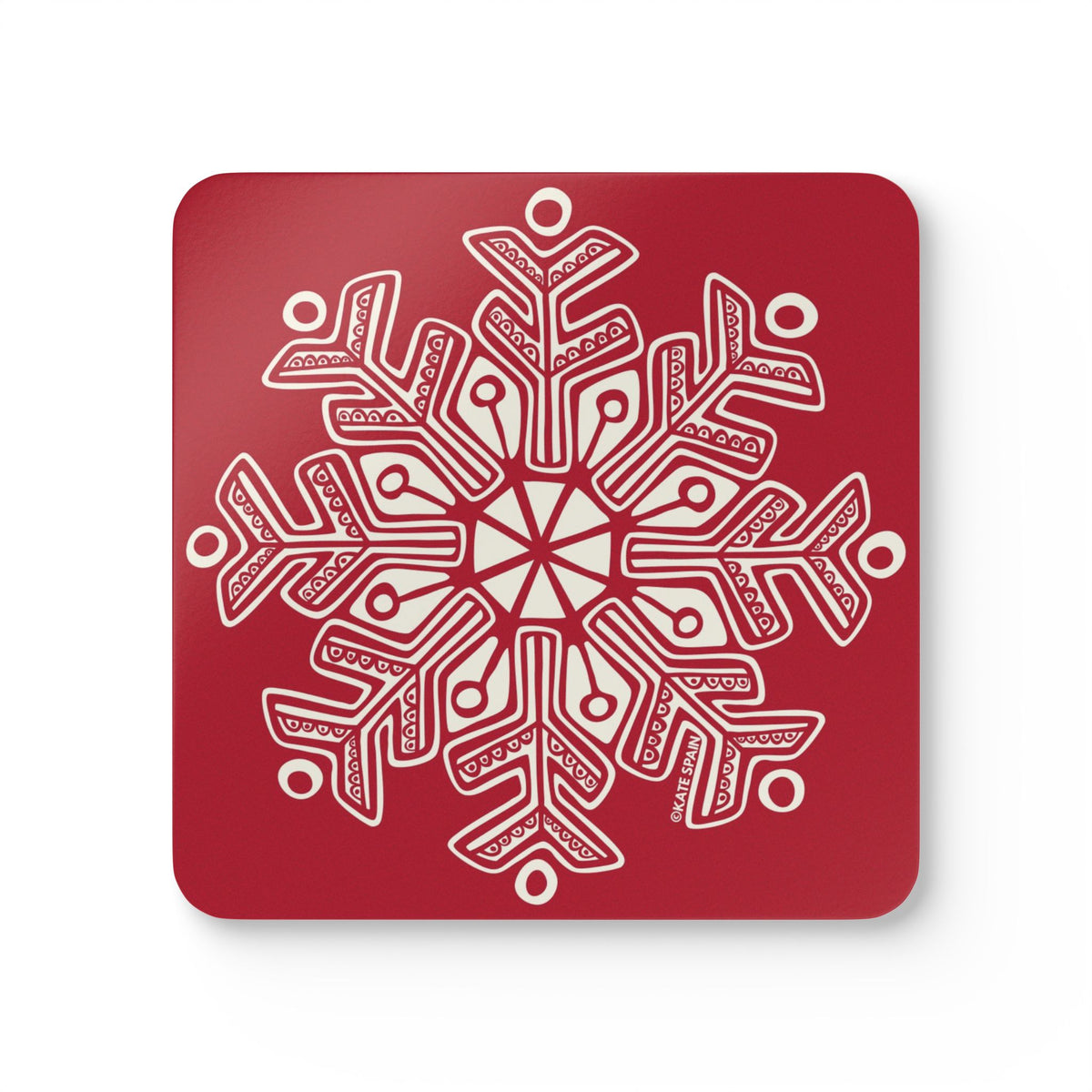 Scandinavian Snow cork-backed coaster, oversized cream snowflake on holiday red, single coaster, top view – Kate Spain design