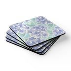 Nantucket Hydrangea cork-backed coaster set of four, periwinkle and lavender hydrangeas with sage leaves on pale aqua, stacked set, angled view – Kate Spain design