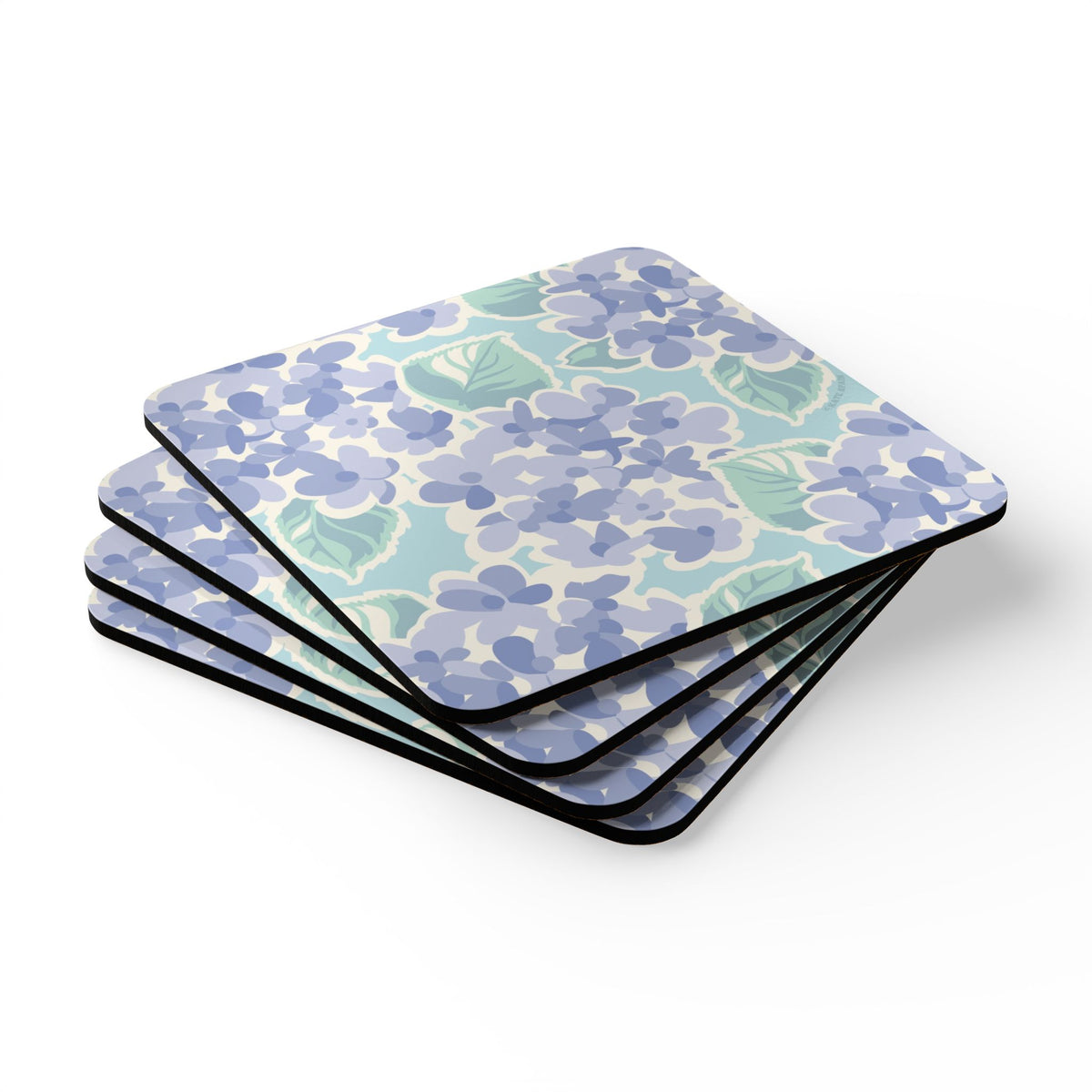 Nantucket Hydrangea cork-backed coaster set of four, periwinkle and lavender hydrangeas with sage leaves on pale aqua, stacked set, angled view – Kate Spain design
