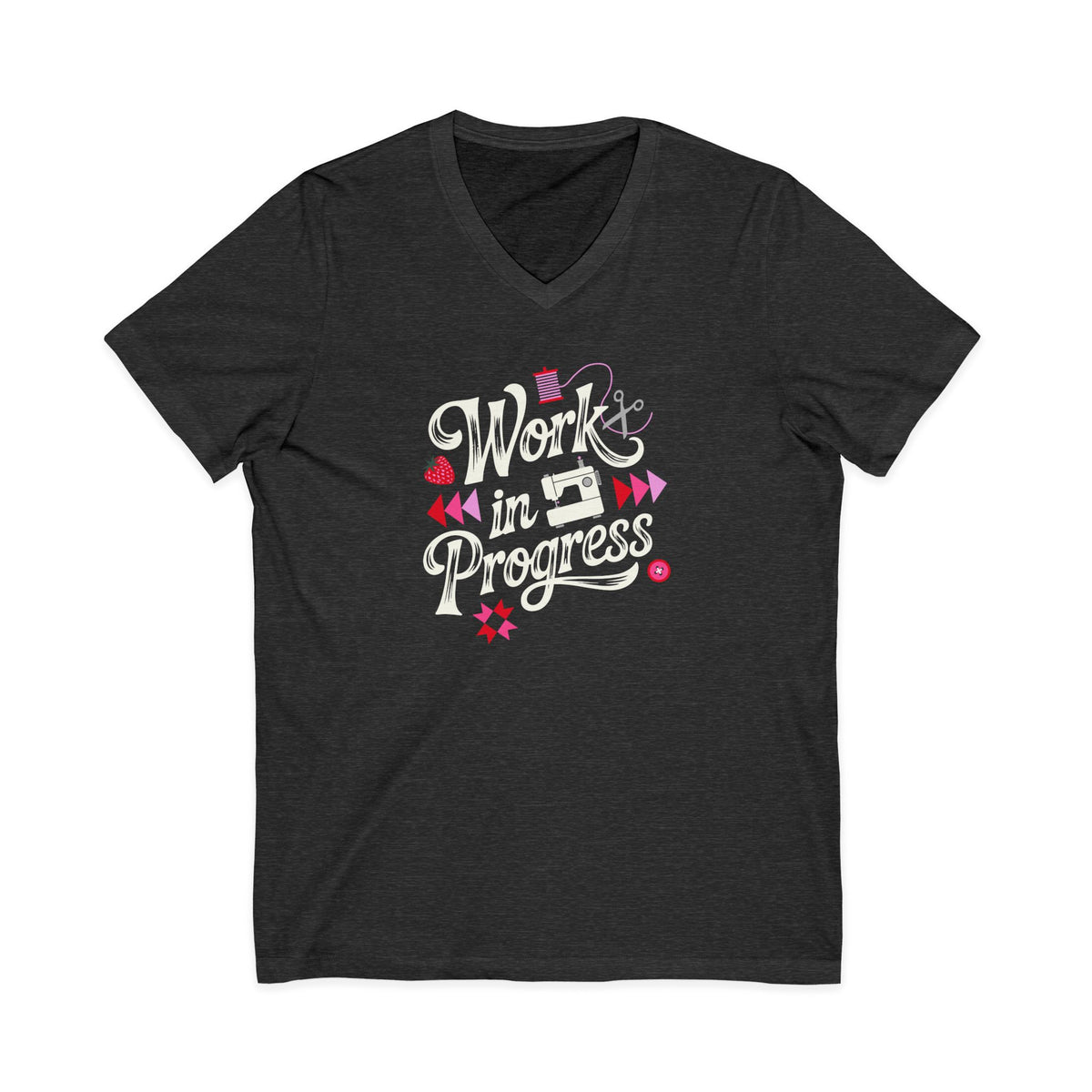 Work in Progress sewing design with flying geese, sewing machine, strawberry and thread spool on a V-neck t-shirt in dark grey heather, front view – Kate Spain design for Pat Sloan