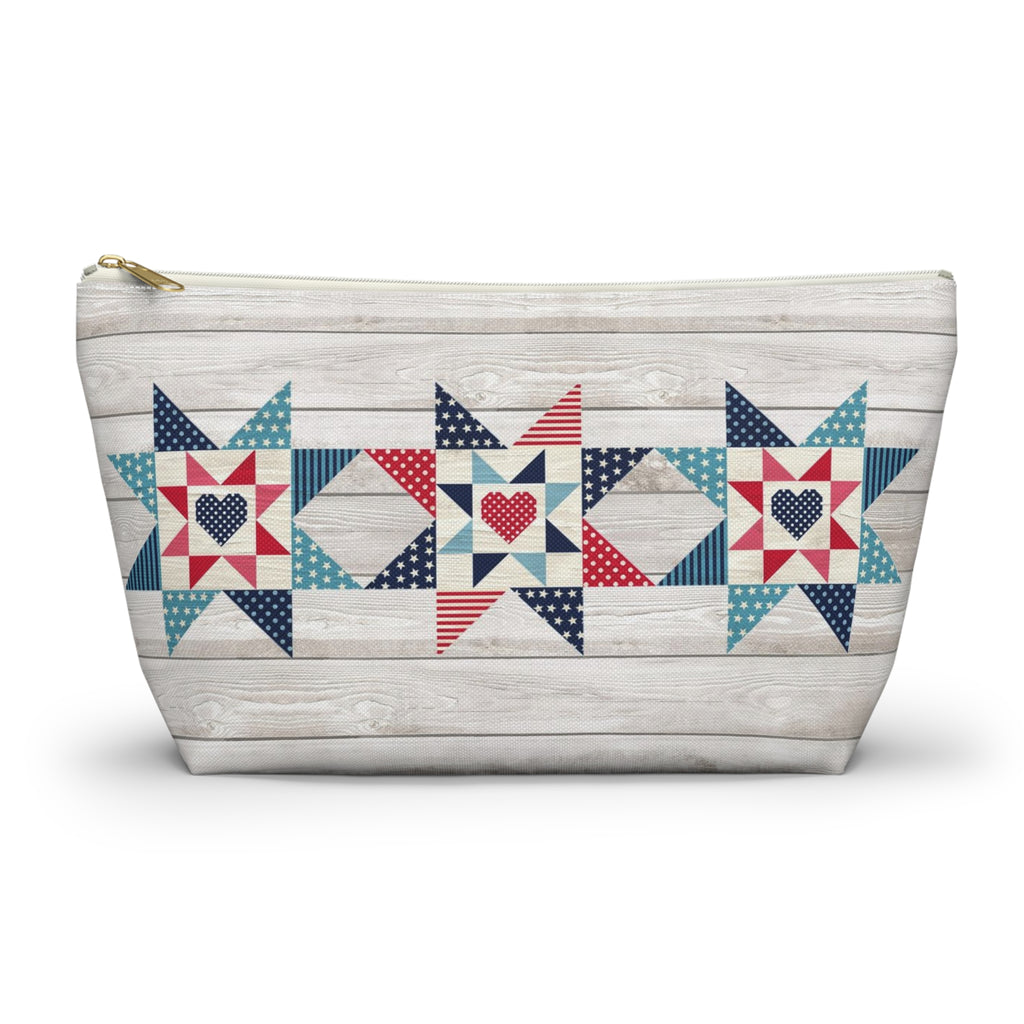 Liberty Love zip pouch with star quilt blocks on the front and hearts on the back, front view – Kate Spain design for Pat Sloan
