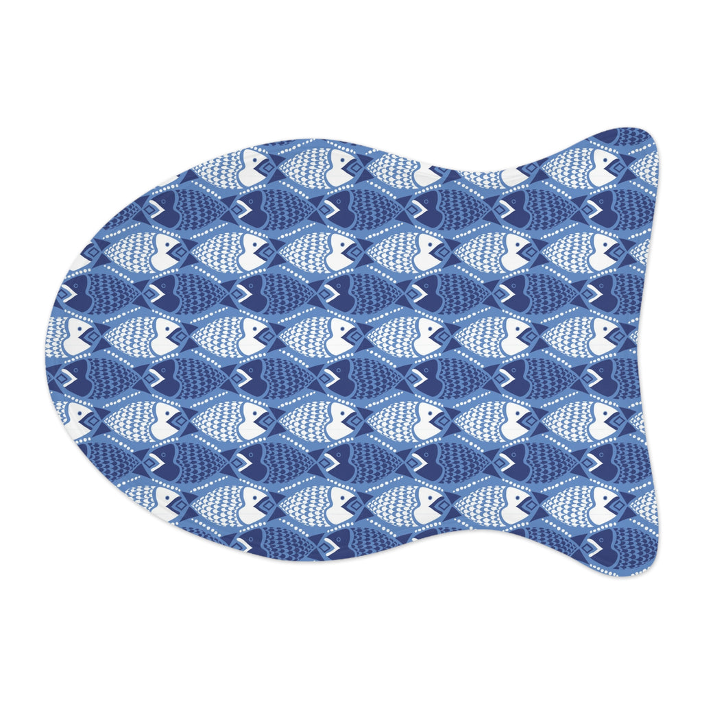 A fish-shaped mouse pad featuring a repeating blue and white fish pattern, shown on a plain white background.
