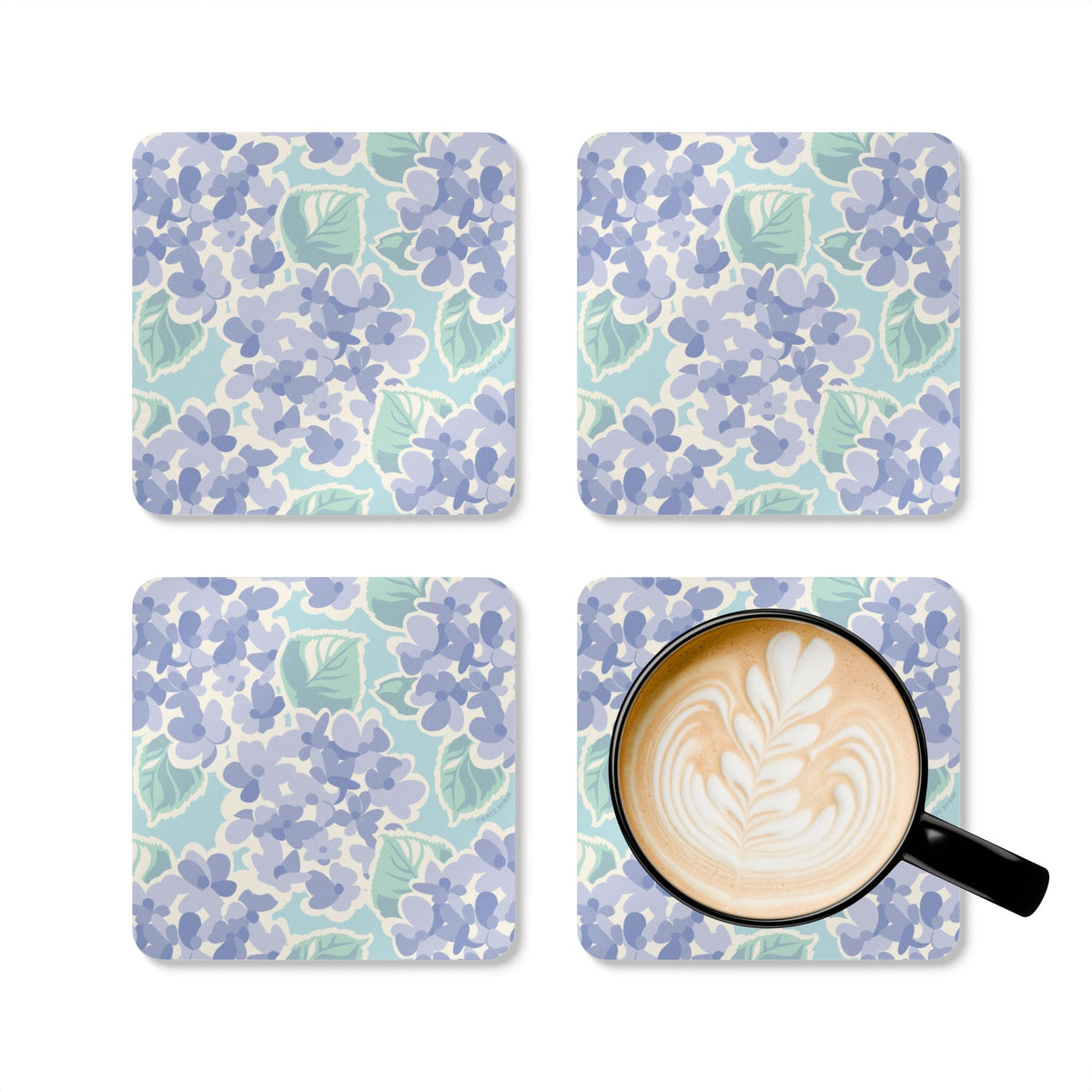 Nantucket Hydrangea cork-backed coaster set of four, periwinkle and lavender hydrangeas with sage leaves on pale aqua, four coasters with a latte mug – Kate Spain design