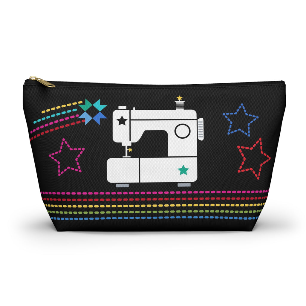 Black zip pouch with the May the ¼" Be With You sewing machine design and stars, front view – Kate Spain design for Pat Sloan