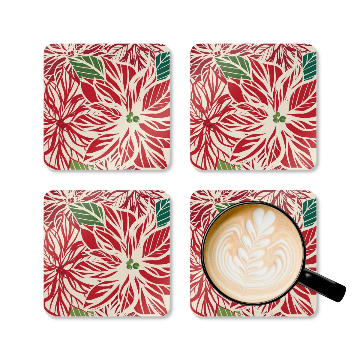 Poinsettia cork-backed coaster set of four, oversized red and cream poinsettia with forest green leaves, four coasters with a latte mug – Kate Spain design