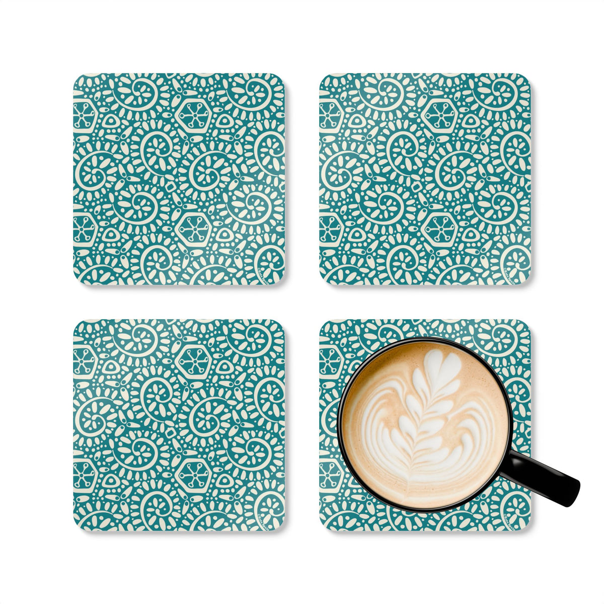 Canto Turquoise cork-backed coaster set of four, cream botanical spirals and petals on turquoise, four coasters with a latte mug – Kate Spain design