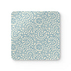 Canto Sky cork-backed coaster, cream botanical spirals and petals on powder blue, single coaster, top view – Kate Spain design