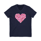 Big Patchwork Love heart pieced from pink half-square triangles on a V-neck t-shirt in navy, front view – Kate Spain design for Pat Sloan