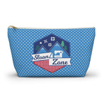 Sloan Zone zip pouch in blue polka dot with the Sloan Zone badge, front view – Kate Spain design for Pat Sloan