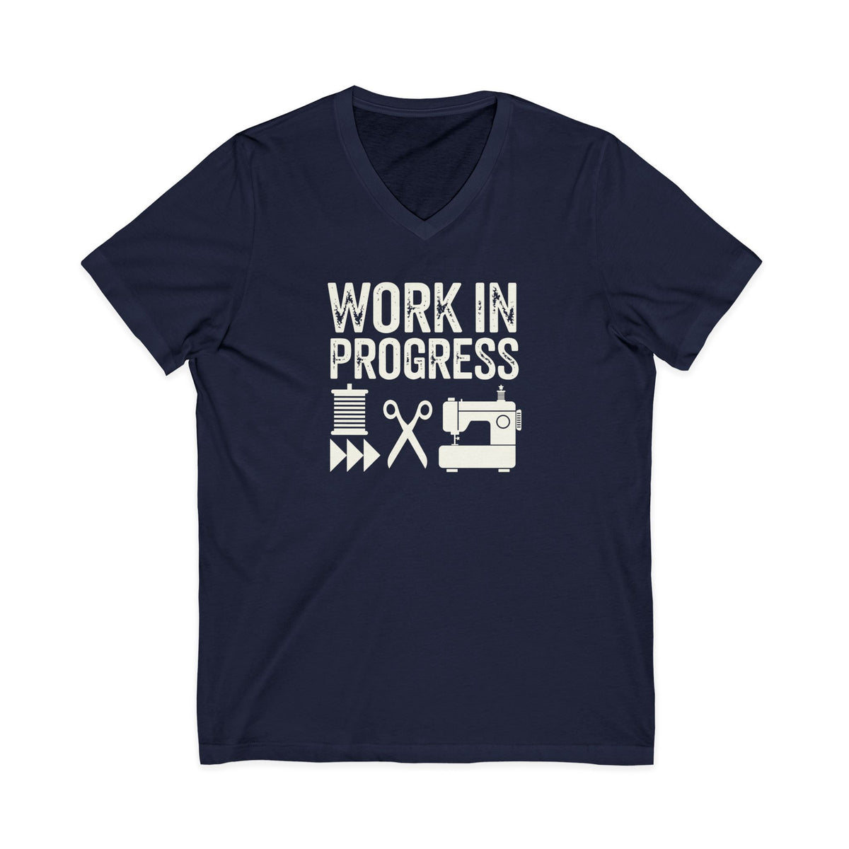 Work in Progress Mod distressed lettering with thread, scissors and sewing machine on a V-neck t-shirt in navy, front view – Kate Spain design for Pat Sloan