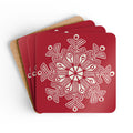 Scandinavian Snow cork-backed coaster set of four, oversized cream snowflake on holiday red, coasters fanned out – Kate Spain design