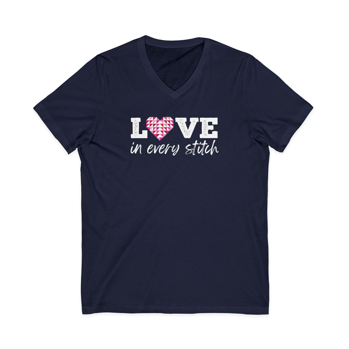 Love in Every Stitch distressed lettering on a V-neck t-shirt in navy, front view – Kate Spain design for Pat Sloan