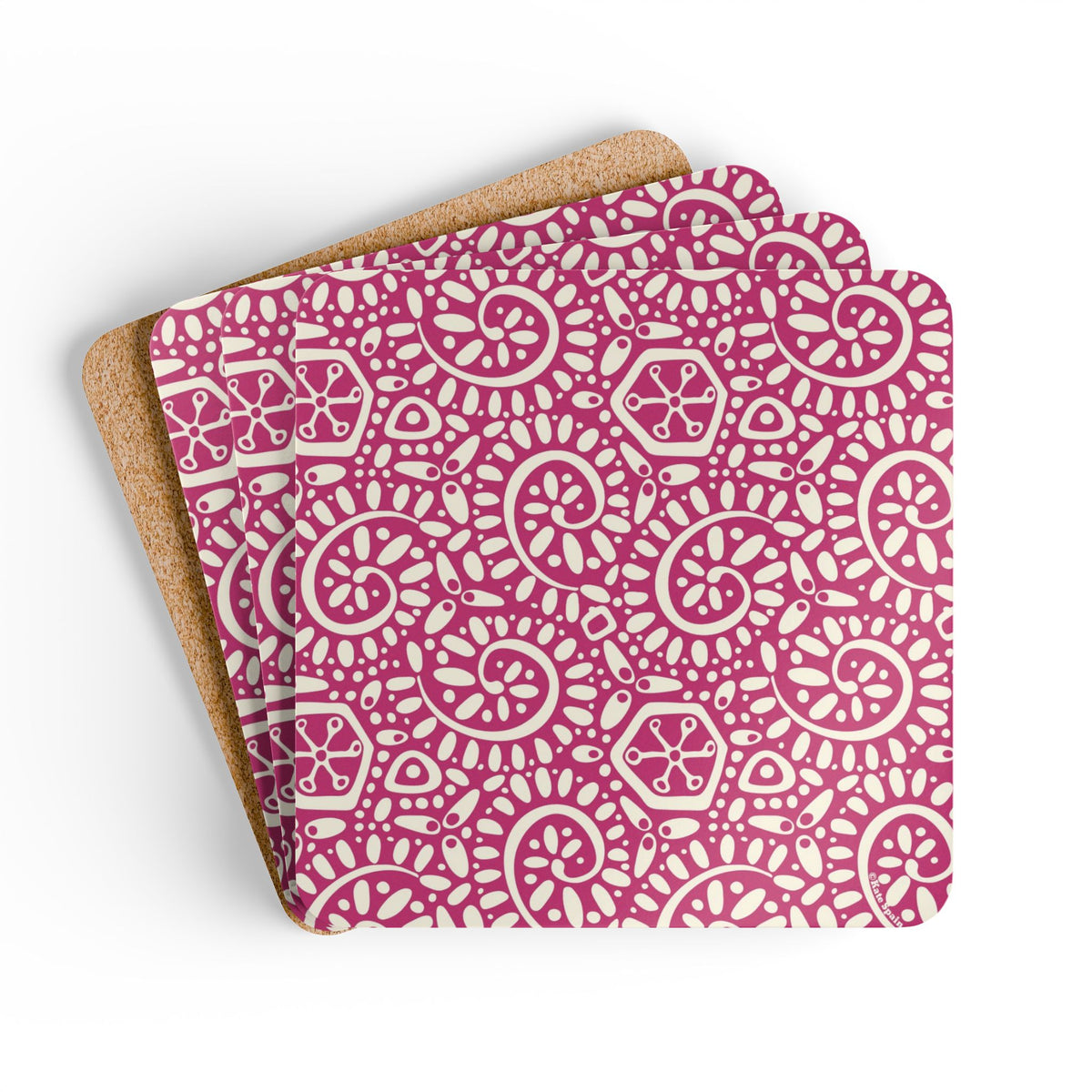 Canto Berry cork-backed coaster set of four, cream botanical spirals and petals on berry fuchsia, coasters fanned out – Kate Spain design