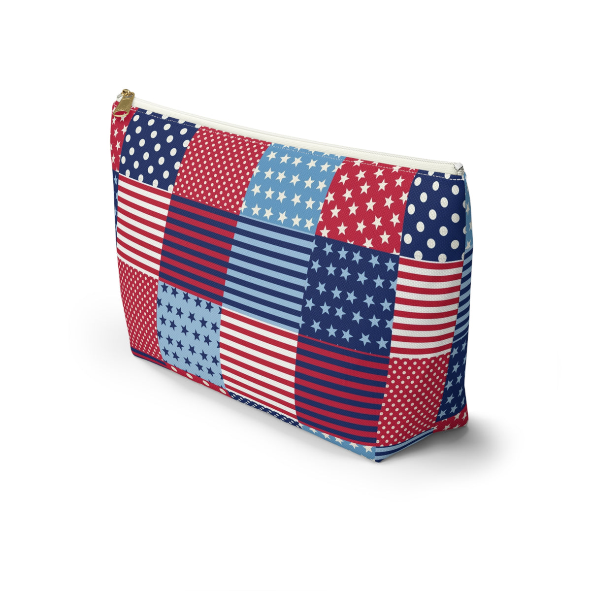 United We Quilt zip pouch in red, white and blue patchwork, angled view – Kate Spain design for Pat Sloan