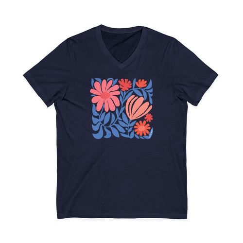 Botanica modern floral design with pink and coral blooms on a V-neck t-shirt in navy, front view – Kate Spain design