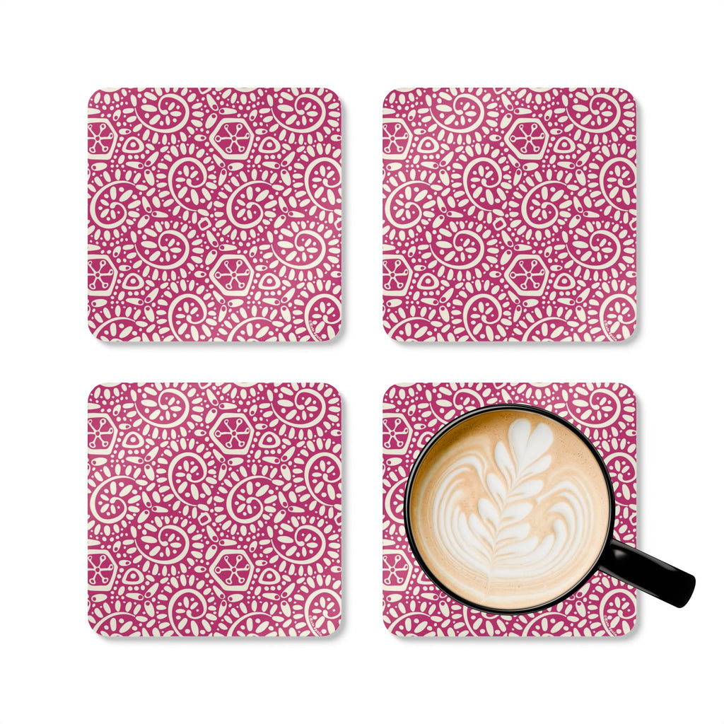 Canto Berry cork-backed coaster set of four, cream botanical spirals and petals on berry fuchsia, four coasters with a latte mug – Kate Spain design