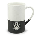 Law of the Paw® dog paw print engraved on a speckled two-tone ceramic mug, white top with black base – Kate Spain design