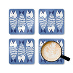 Catch of the Day cork-backed coaster set of four, white and navy stylized fish on periwinkle blue, four coasters with a latte mug – Kate Spain design