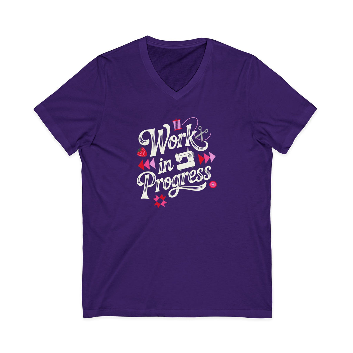 Work in Progress sewing design with flying geese, sewing machine, strawberry and thread spool on a V-neck t-shirt in purple, front view – Kate Spain design for Pat Sloan
