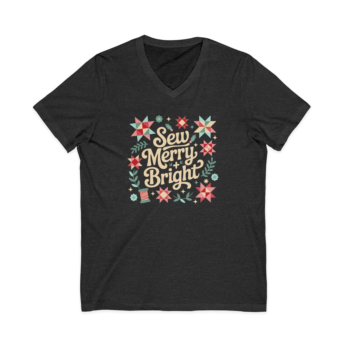 Sew Merry + Bright lettering with quilt-block stars, holly and a thread spool on a V-neck t-shirt in dark grey heather, front view – Kate Spain design for Pat Sloan