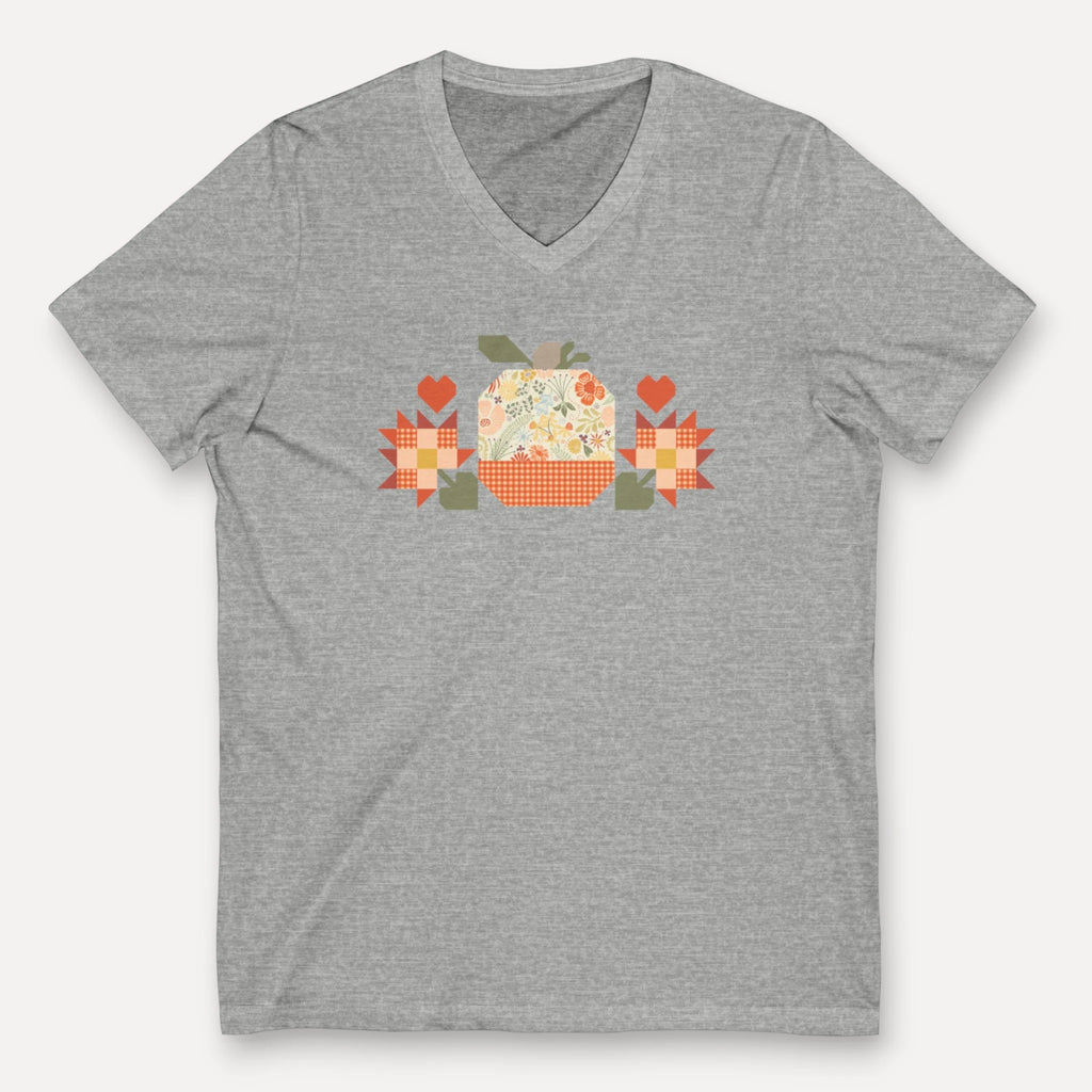 Falling for Fall patchwork pumpkin with quilt-block stars and hearts on a V-neck t-shirt in athletic heather grey, front view – Kate Spain design for Pat Sloan