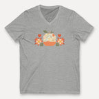 Falling for Fall patchwork pumpkin with quilt-block stars and hearts on a V-neck t-shirt in athletic heather grey, front view – Kate Spain design for Pat Sloan