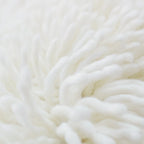 nothing to hide hand-knotted shag throw rug in undyed natural white New Zealand wool, extreme close-up of the wool – Kate Spain design
