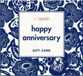 A square gift card design with a navy blue floral pattern border and a central white label reading 'kdspain happy anniversary GIFT CARD' in navy and coral text.