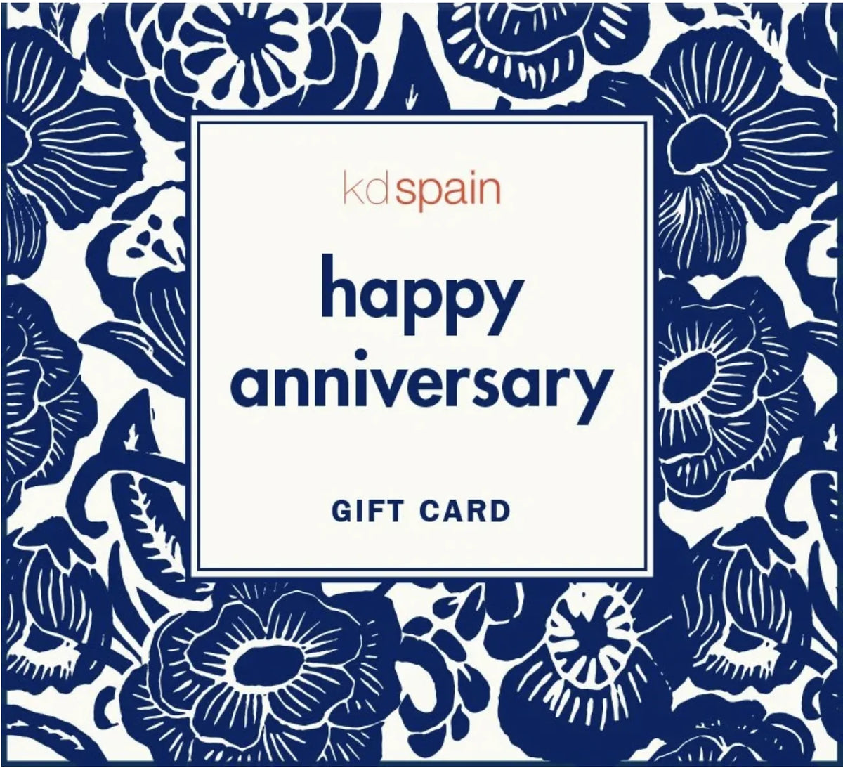 A square gift card design with a navy blue floral pattern border and a central white label reading 'kdspain happy anniversary GIFT CARD' in navy and coral text.