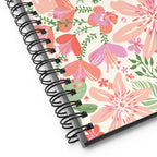Bonaire Spiral Notebook in Coral, close-up of the black wire-o binding and cream floral cover – Kate Spain design