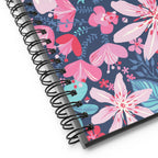 Bonaire Spiral Notebook in Lagoon, close-up of the black wire-o binding and navy floral cover – Kate Spain design