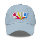 Colorful “QUILT” lettering embroidered baseball cap in light blue, front view – Kate Spain Moda Quilt design