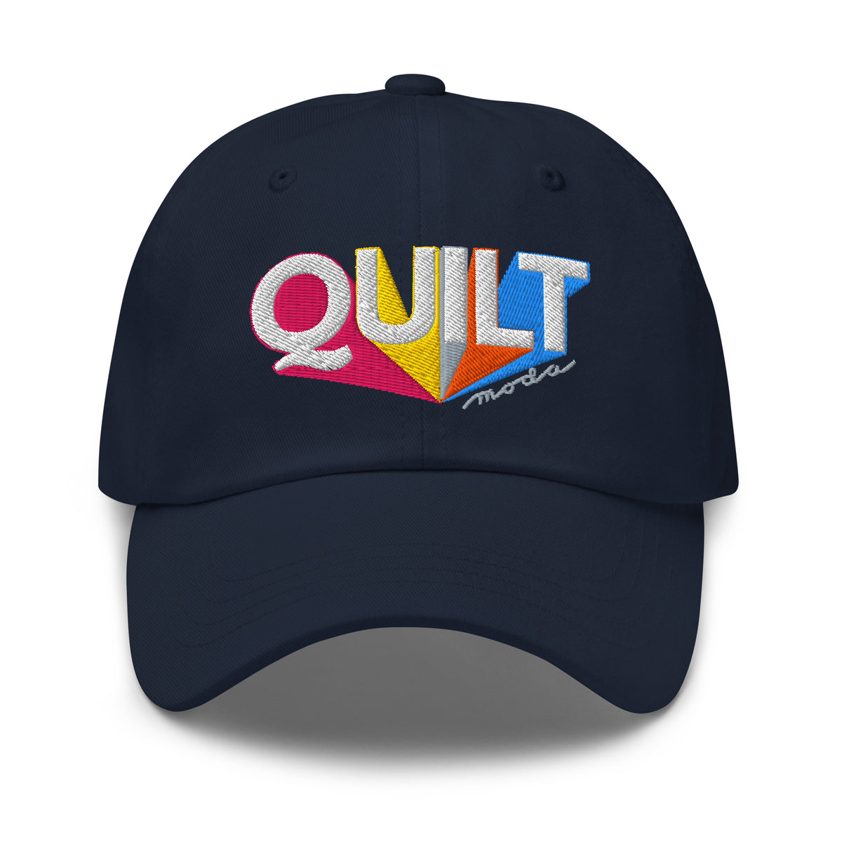 Colorful “QUILT” lettering embroidered baseball cap in navy, front view – Kate Spain Moda Quilt design