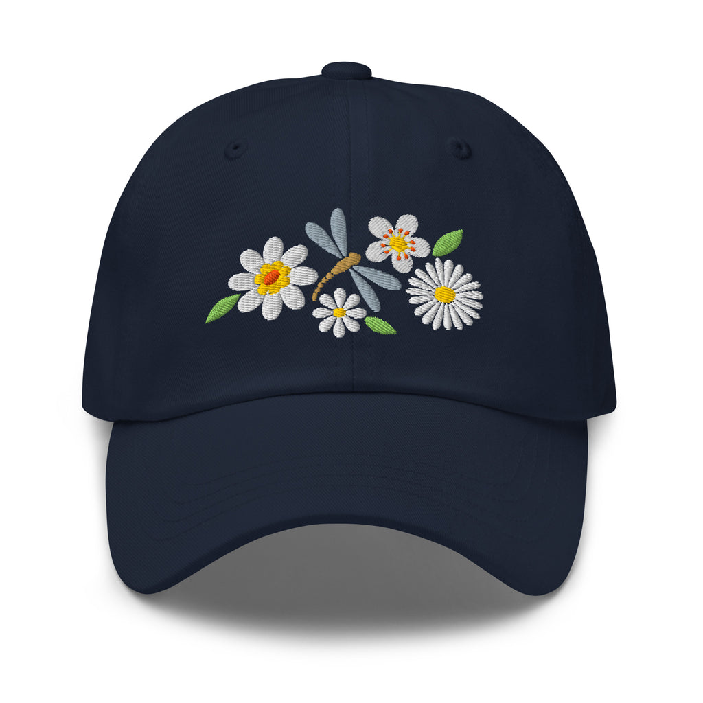 Dragonfly and white daisies embroidered baseball cap in navy, front view – Kate Spain design
