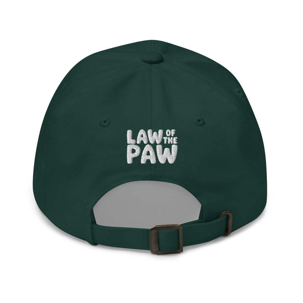Law of the Paw® logo on the back of an embroidered baseball cap in forest green, back view – Kate Spain design