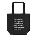 Moda precuts list in white on a black organic cotton tote bag, front view – Kate Spain design